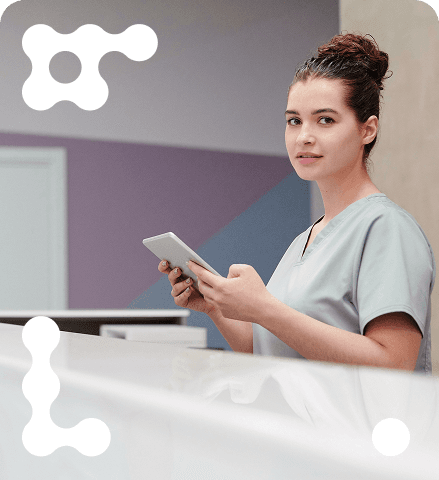 Medical professional with tablet in a modern medical office